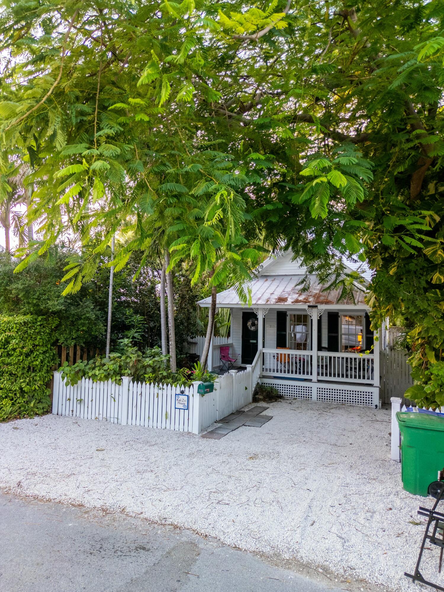 1033 Catherine Street Key West, FL 33040 - Photo 35 of 39 a front view of a house with a garden