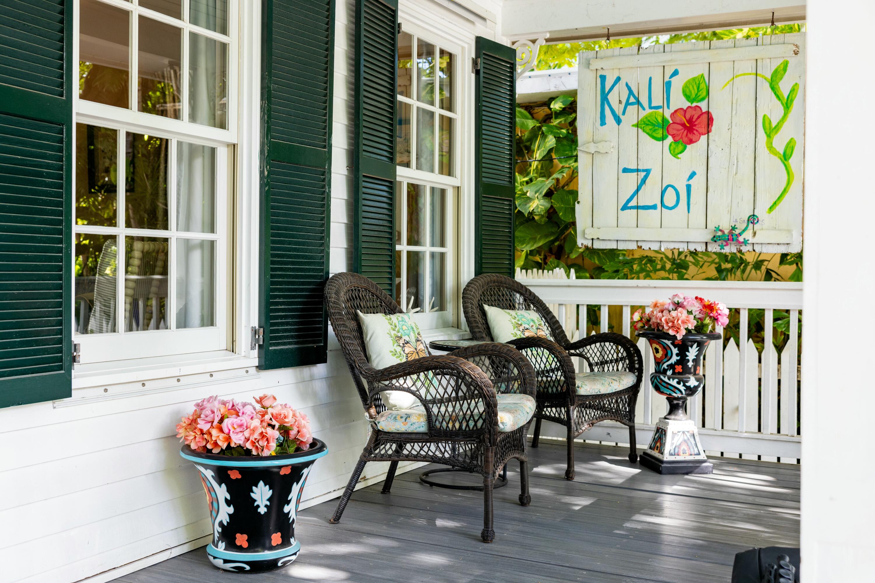 1033 Catherine Street Key West, FL 33040 - Photo 6 of 39 a view of a tables and chairs in a patio