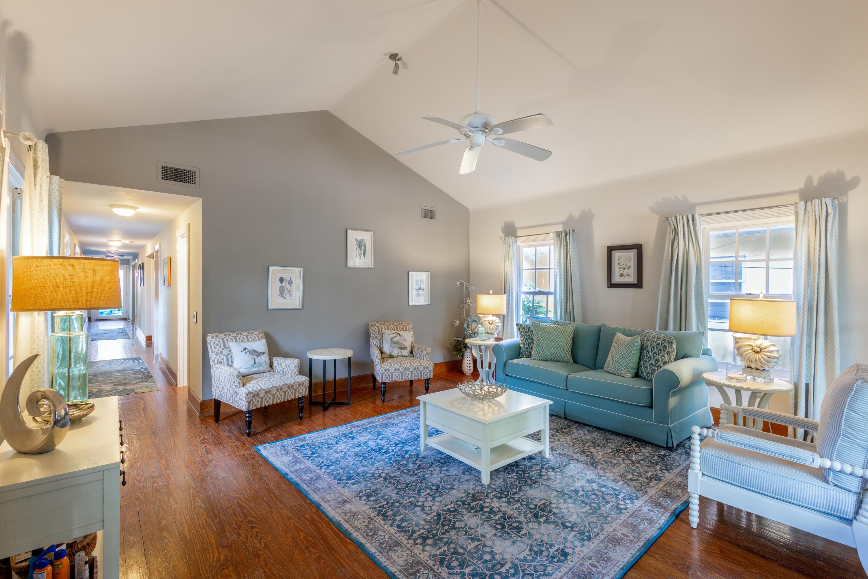 1033 Catherine Street Key West, FL 33040 - Photo 8 of 39 a living room with furniture or couch and a wooden floor