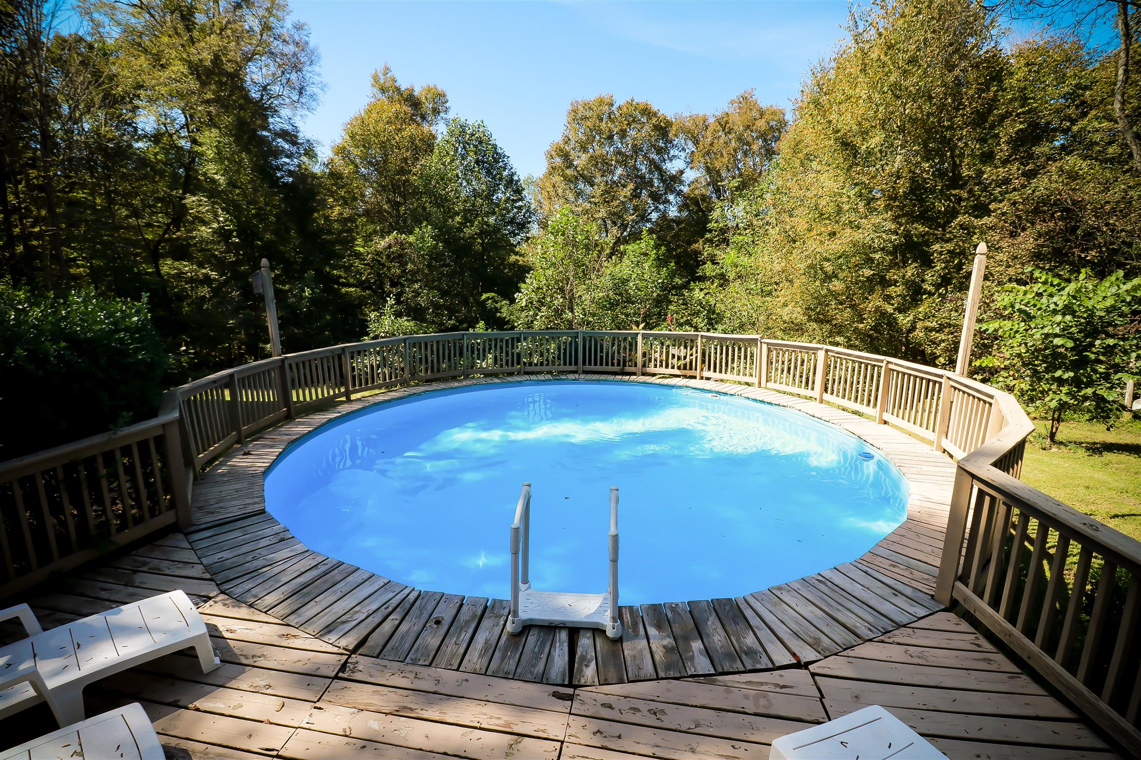 4639 Cathey Ridge Road Manchester, TN 37355 - Photo 19 of 30 a view of a swimming pool with a patio