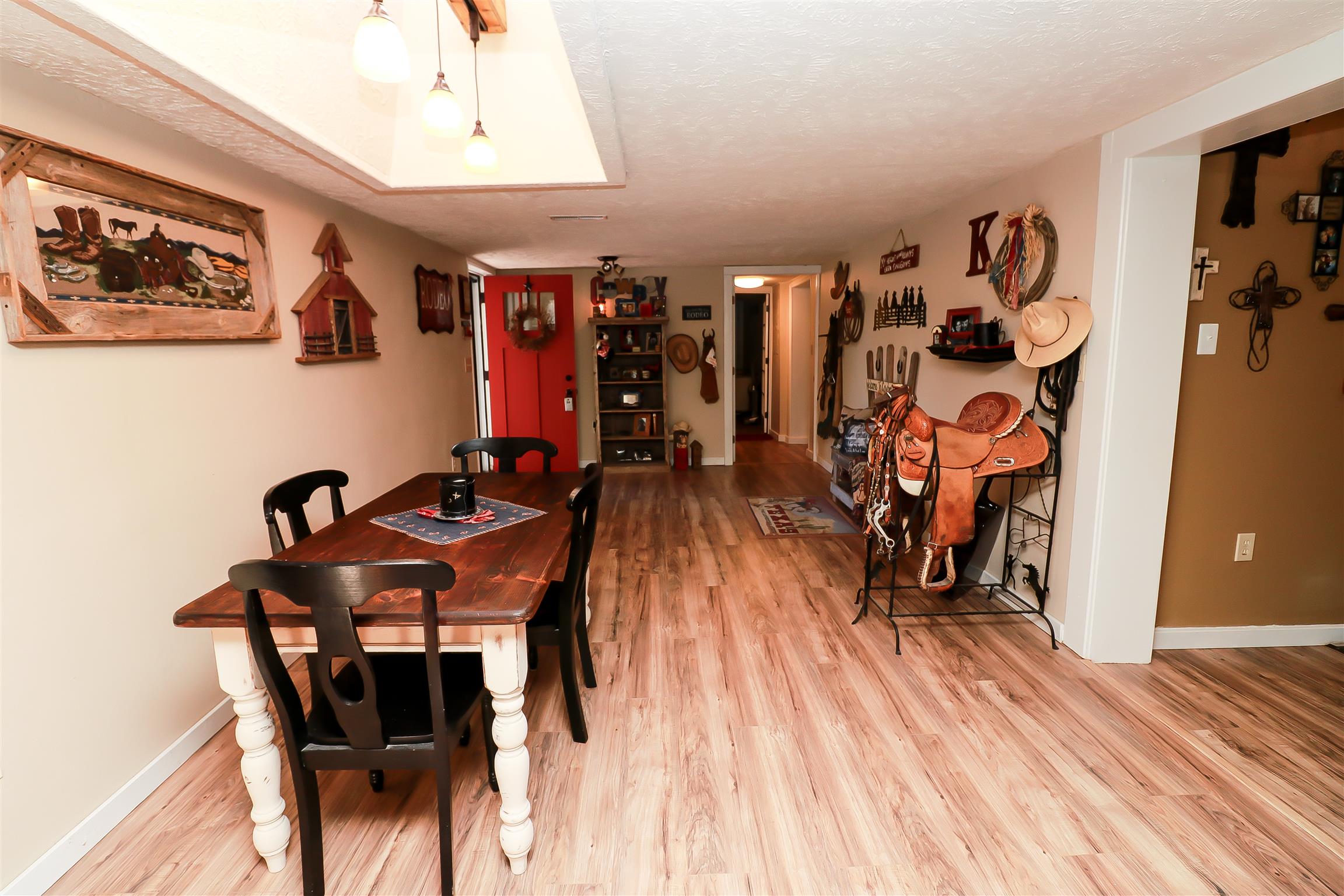 4639 Cathey Ridge Road Manchester, TN 37355 - Photo 4 of 30 a view of a dining room with furniture and wooden floor