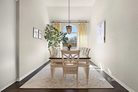a view of a dining room with furniture