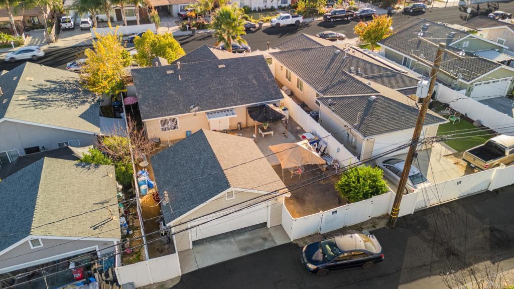154 East 11th Street Perris, CA 92570 - Photo 30 of 37 an aerial view of a house with a swimming pool
