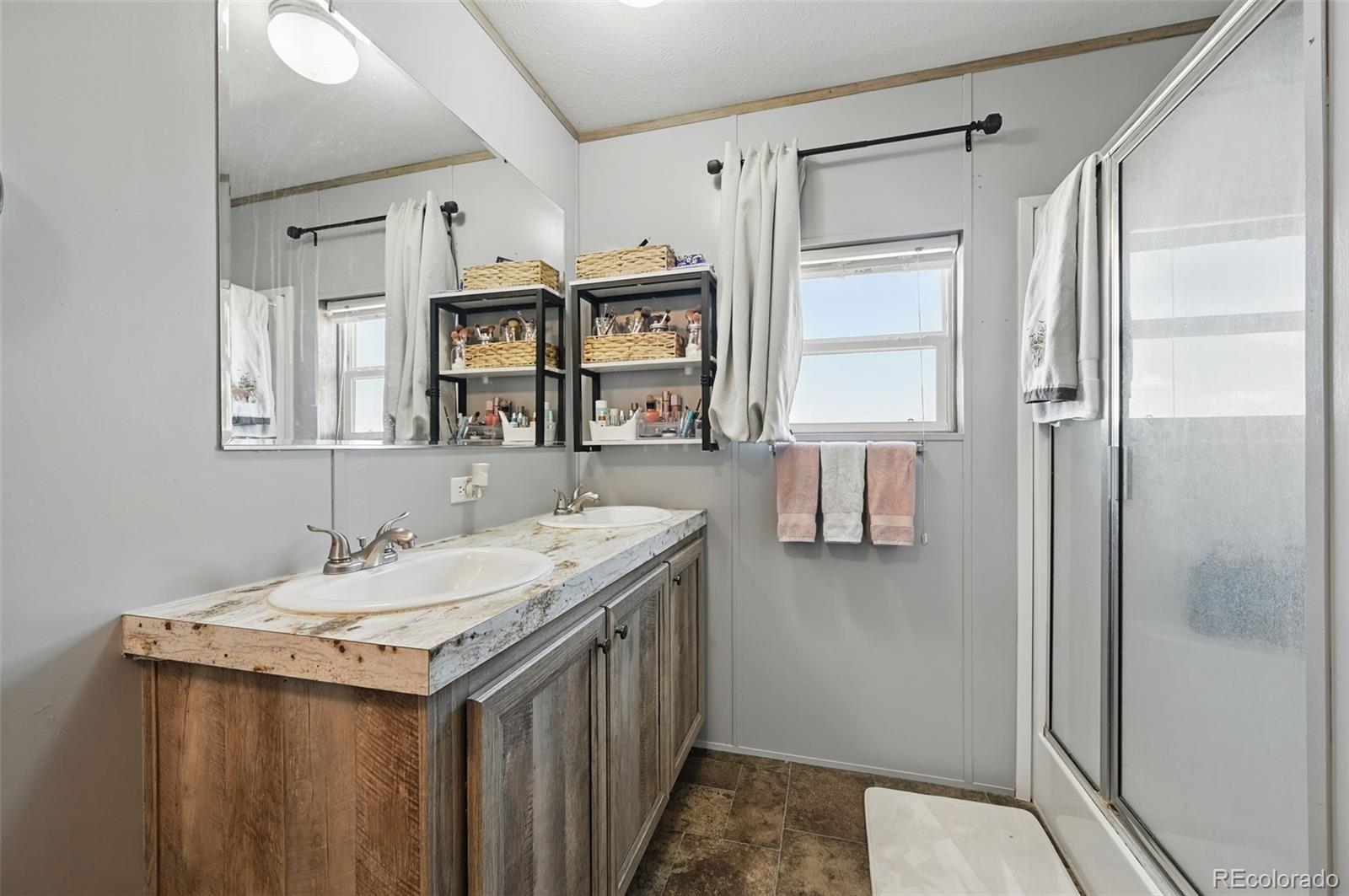 30890 Ken View Yoder, CO 80864 - Photo 19 of 36 a kitchen with a sink stove and refrigerator
