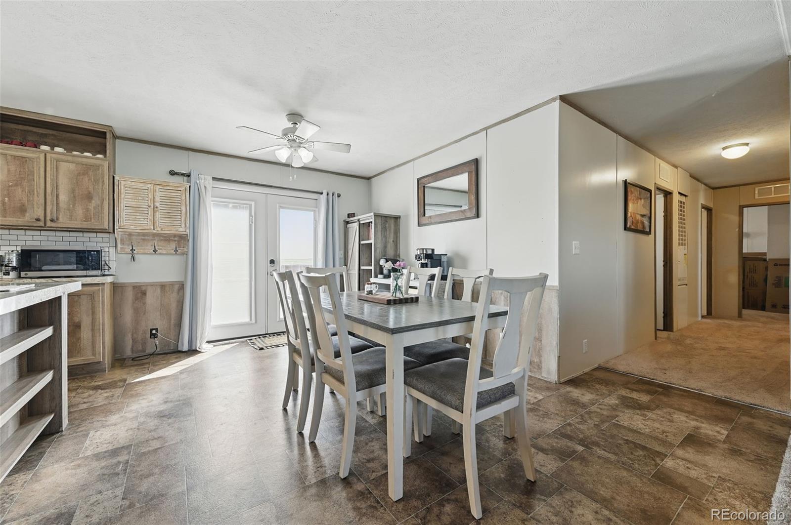 30890 Ken View Yoder, CO 80864 - Photo 5 of 36 a view of a dining room with furniture