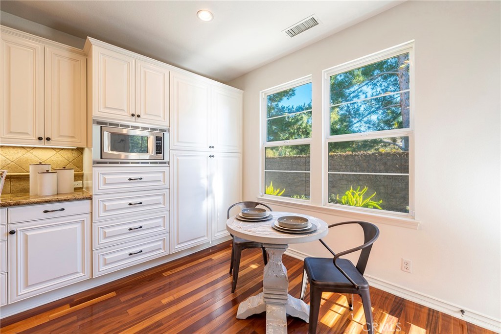 6 Shepherd Court Ladera Ranch, CA 92694 - Photo 16 of 68 a view of a dining room with furniture and windows