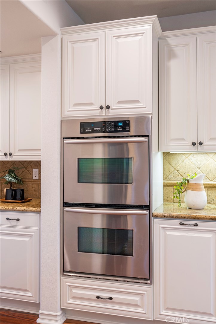 6 Shepherd Court Ladera Ranch, CA 92694 - Photo 19 of 68 a kitchen with appliances and cabinets