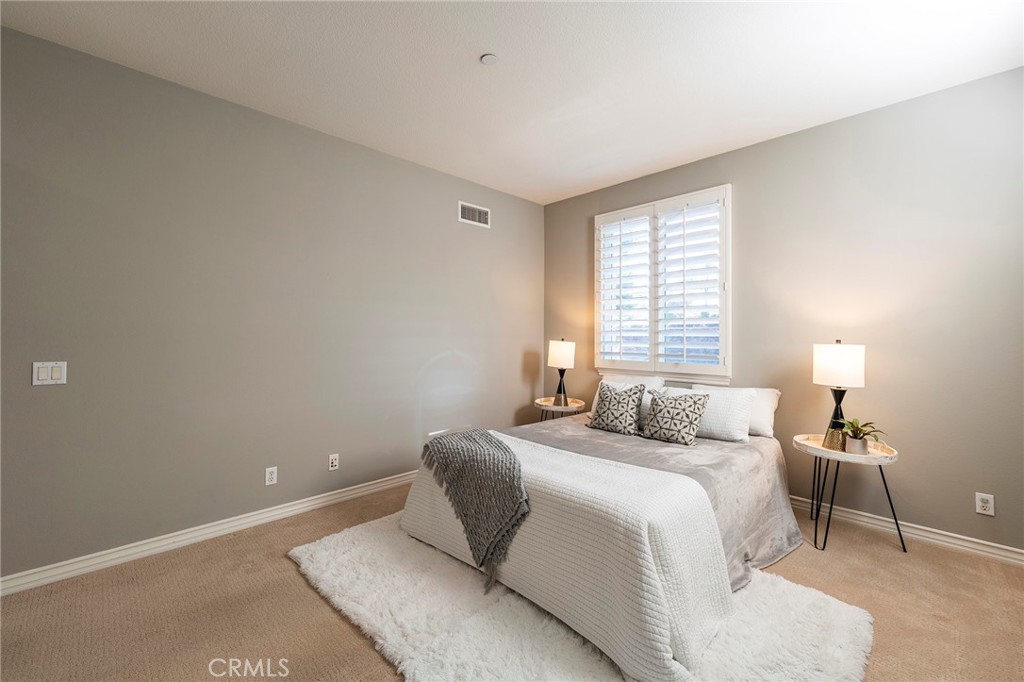 6 Shepherd Court Ladera Ranch, CA 92694 - Photo 20 of 68 a bedroom with a bed and a window
