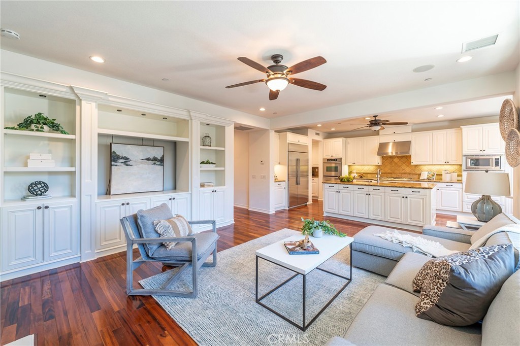 6 Shepherd Court Ladera Ranch, CA 92694 - Photo 2 of 68 a living room with furniture and kitchen view
