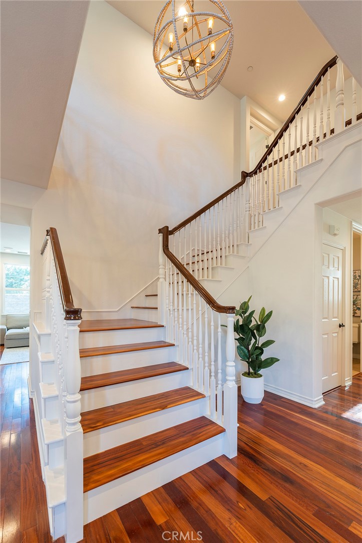6 Shepherd Court Ladera Ranch, CA 92694 - Photo 22 of 68 a view of entryway and hall with wooden floor