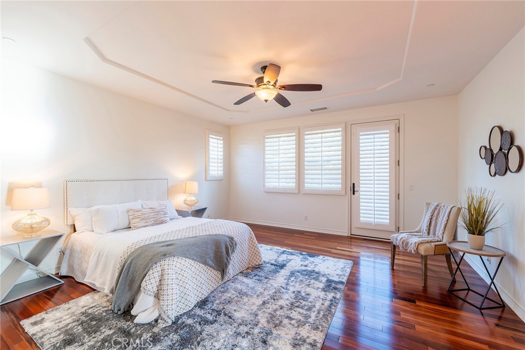 6 Shepherd Court Ladera Ranch, CA 92694 - Photo 23 of 68 a bedroom with bed and wooden floor