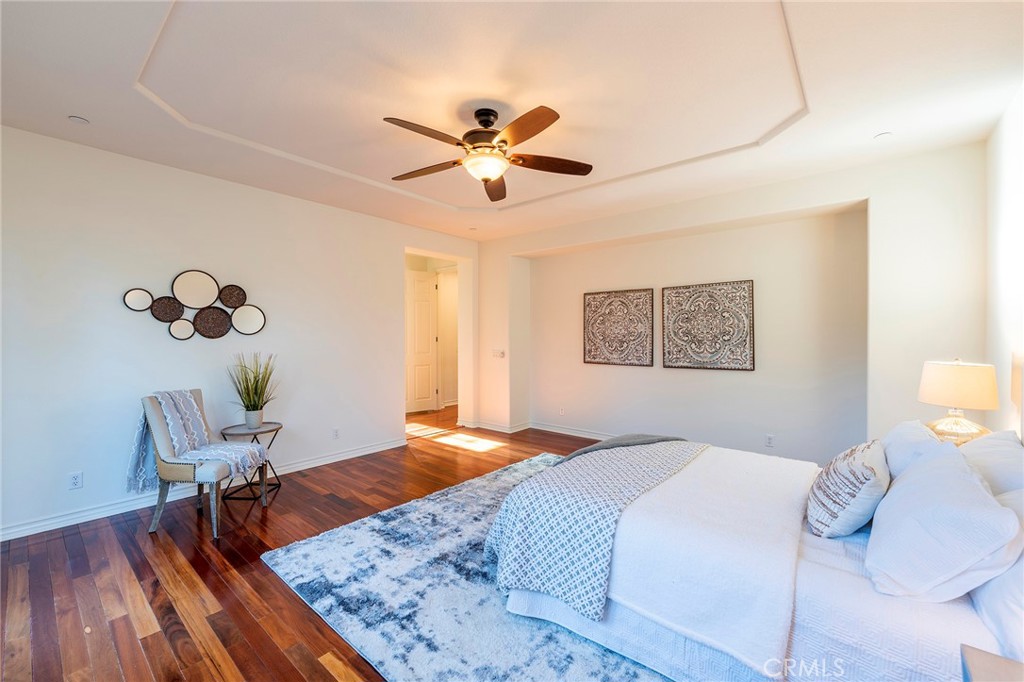 6 Shepherd Court Ladera Ranch, CA 92694 - Photo 24 of 68 a bedroom with a bed and a table