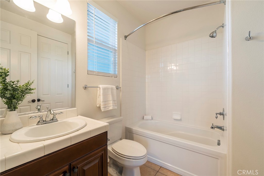 6 Shepherd Court Ladera Ranch, CA 92694 - Photo 30 of 68 a bathroom with a sink a toilet and a bathtub