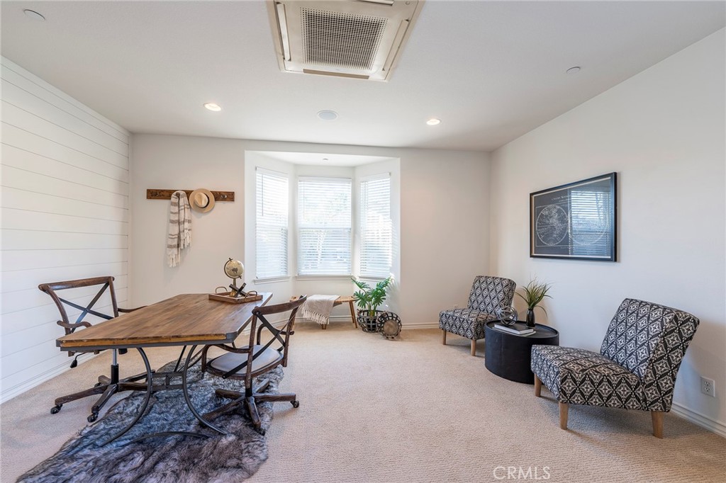 6 Shepherd Court Ladera Ranch, CA 92694 - Photo 35 of 68 a living room with furniture and a window