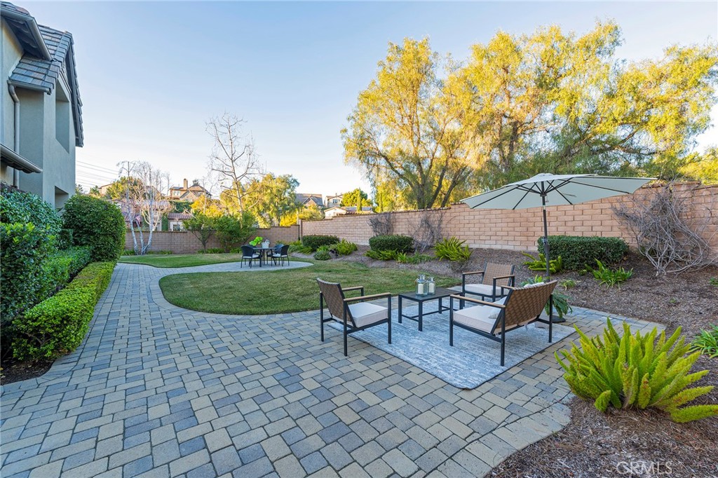 6 Shepherd Court Ladera Ranch, CA 92694 - Photo 47 of 68 a view of a garden with an outdoor seating
