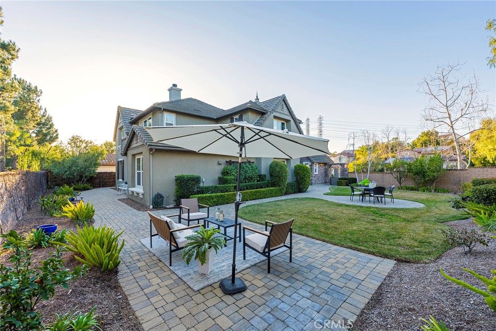 6 Shepherd Court Ladera Ranch, CA 92694 - Photo 48 of 68 a view of a house with backyard sitting area and garden