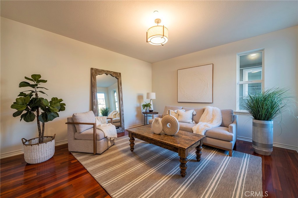 6 Shepherd Court Ladera Ranch, CA 92694 - Photo 5 of 68 a living room with furniture potted plant and a lamp