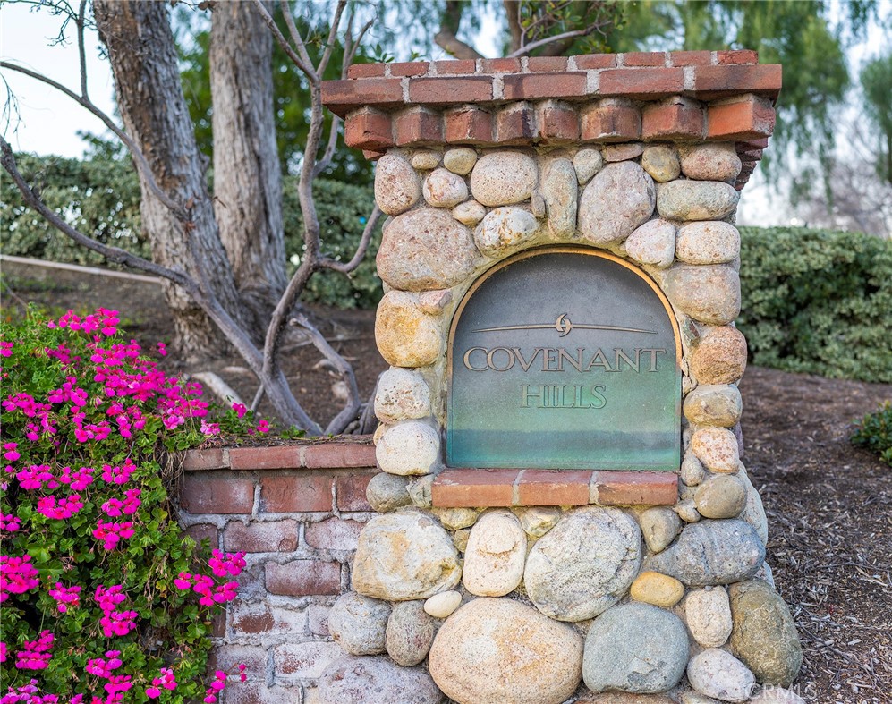 6 Shepherd Court Ladera Ranch, CA 92694 - Photo 59 of 68 a front view of a house with a bunch of flowers