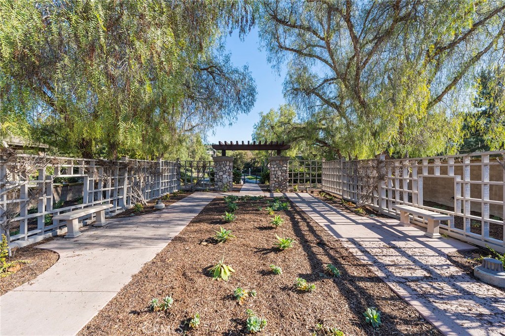 6 Shepherd Court Ladera Ranch, CA 92694 - Photo 67 of 68 a view of a yard with wooden fence