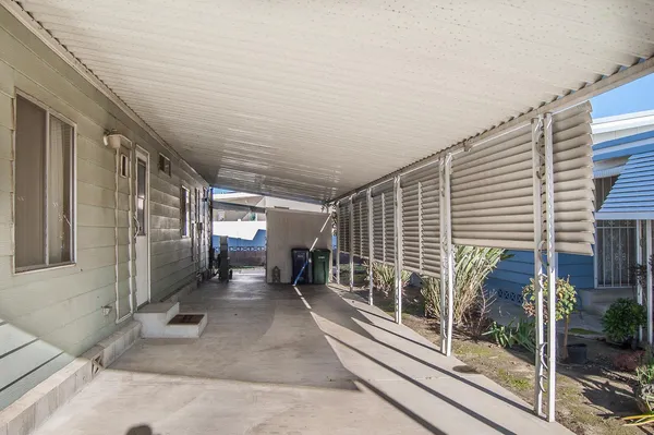 a view of a room with a windows and a table