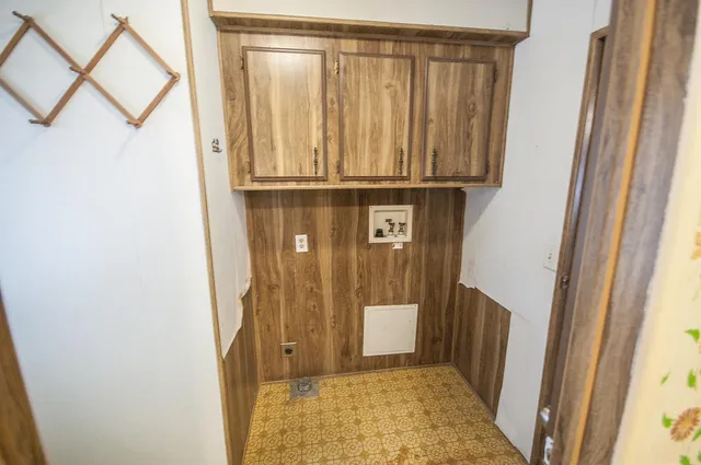 a bathroom with a sink a vanity and a mirror