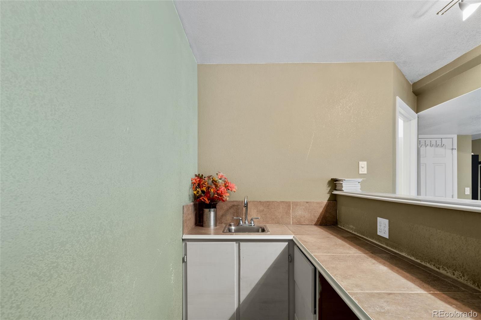 10245 Dusk Street Firestone, CO 80504 - Photo 20 of 24 a room with storage and utility