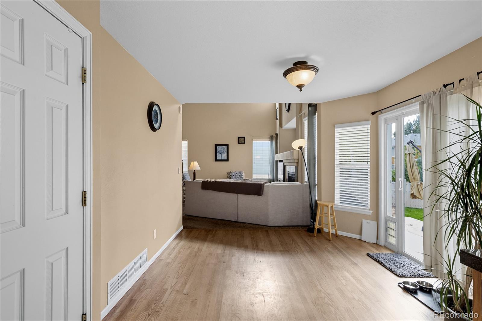 10245 Dusk Street Firestone, CO 80504 - Photo 7 of 24 a living room with furniture and a flat screen tv