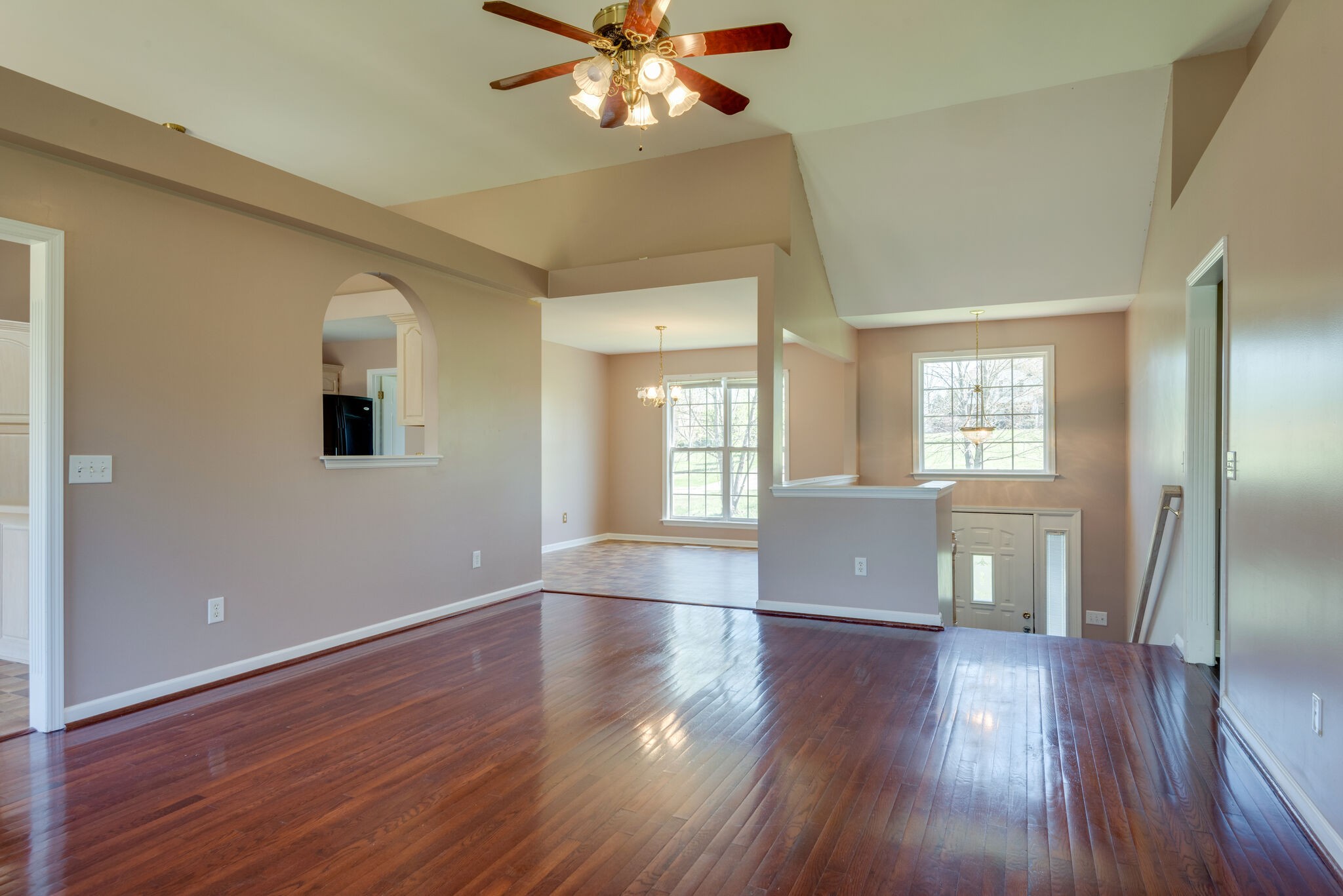 828 Rands Way Columbia, TN 38401 - Photo 8 of 30 a view of an empty room with wooden floor and a window