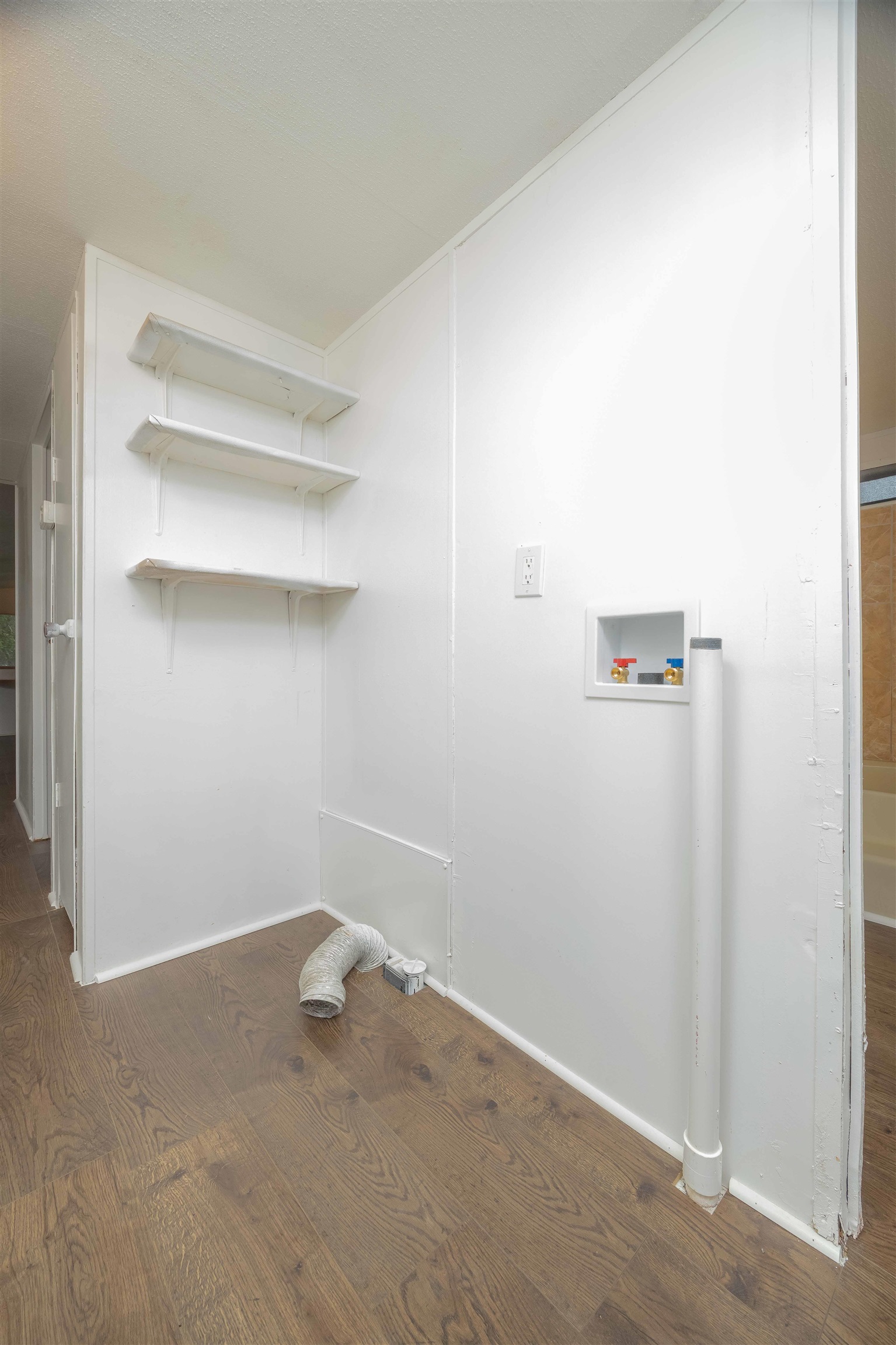 7553 U.S. Rte 1 St. Augustine, FL 32086 - Photo 12 of 16 a view of a room with racks on the wall