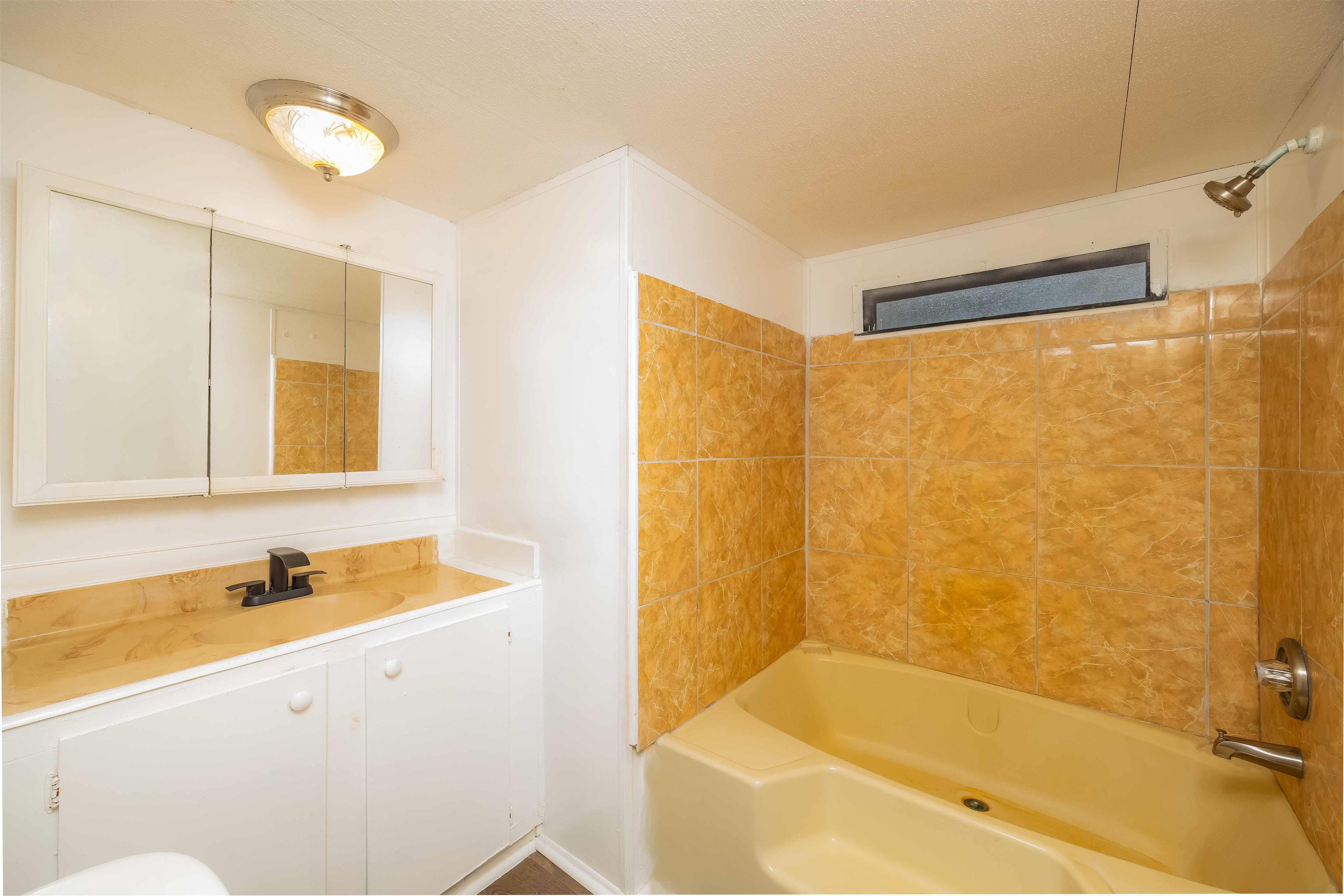 7553 U.S. Rte 1 St. Augustine, FL 32086 - Photo 14 of 16 a bathroom with a bathtub and a sink