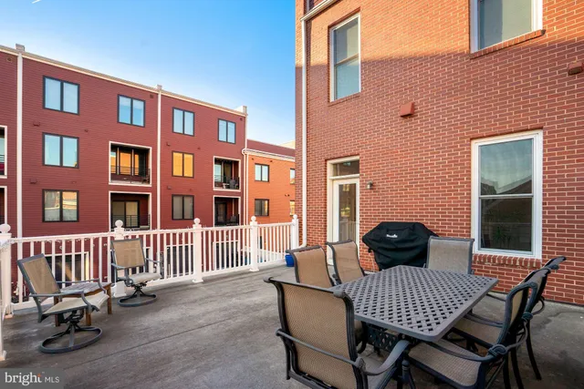 a view of a chair and table and chair