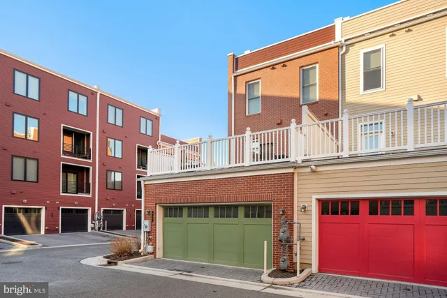 a front view of a building with a road