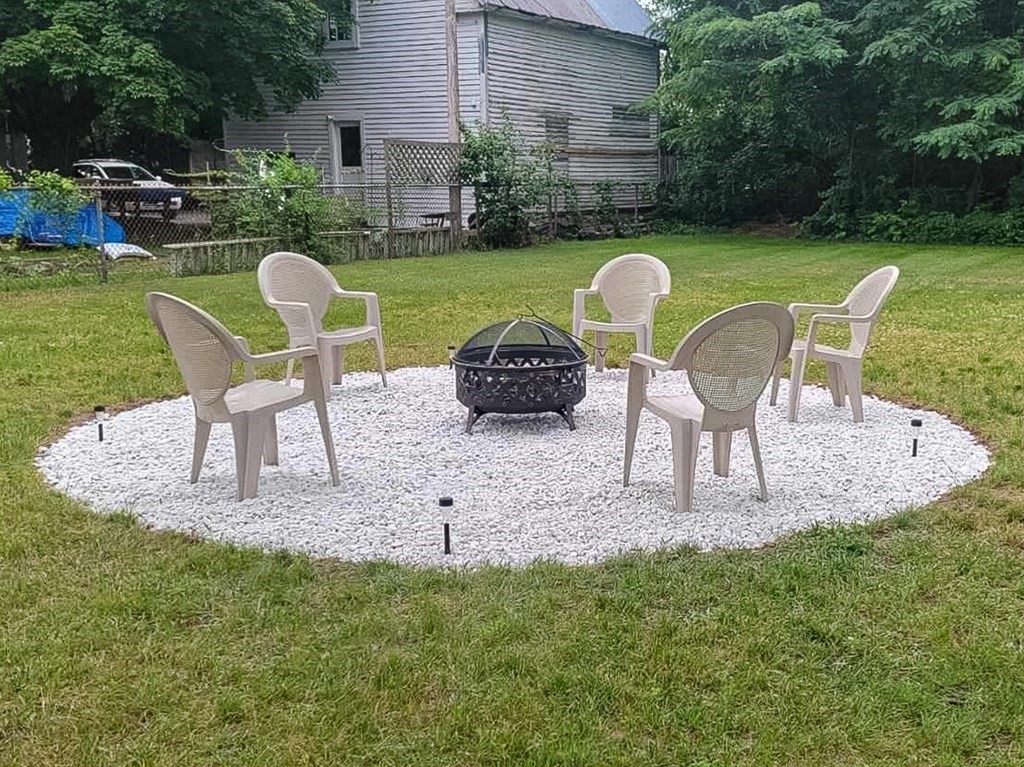 192 Allen Street Springfield, MA 01108 - Photo 28 of 35 a couple of chairs sitting in backyard of house