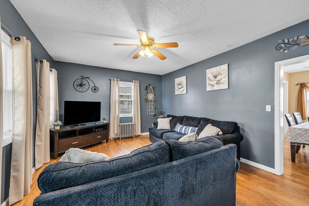 192 Allen Street Springfield, MA 01108 - Photo 5 of 35 a living room with furniture and a flat screen tv