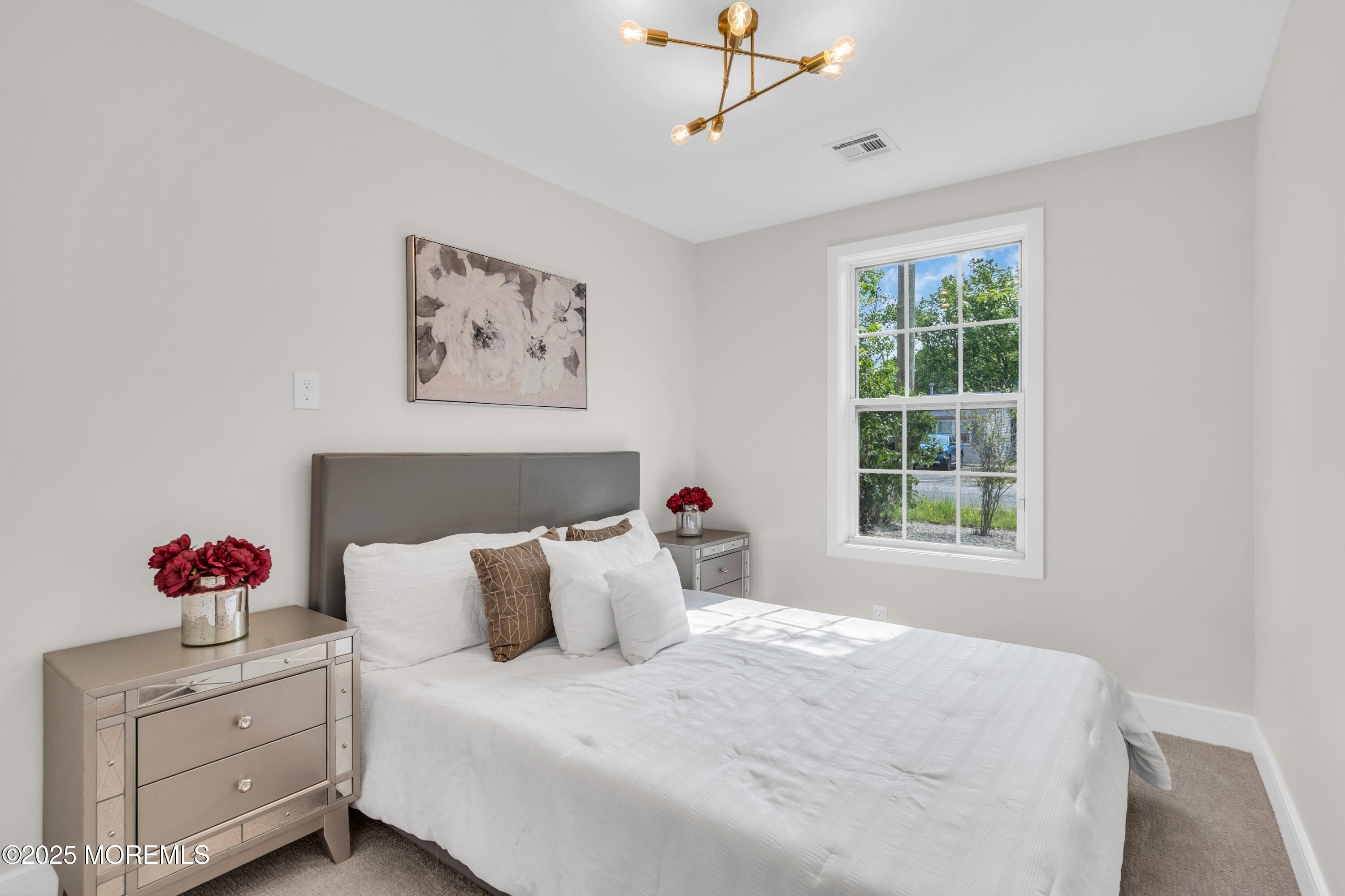 882 Radio Road Little Egg Harbor, NJ 08087 - Photo 16 of 24 a bedroom with a bed and a window