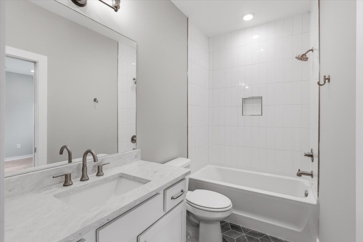 109 A Duke Street Nashville, TN 37207 - Photo 18 of 21 a bathroom with a sink mirror toilet and bathtub