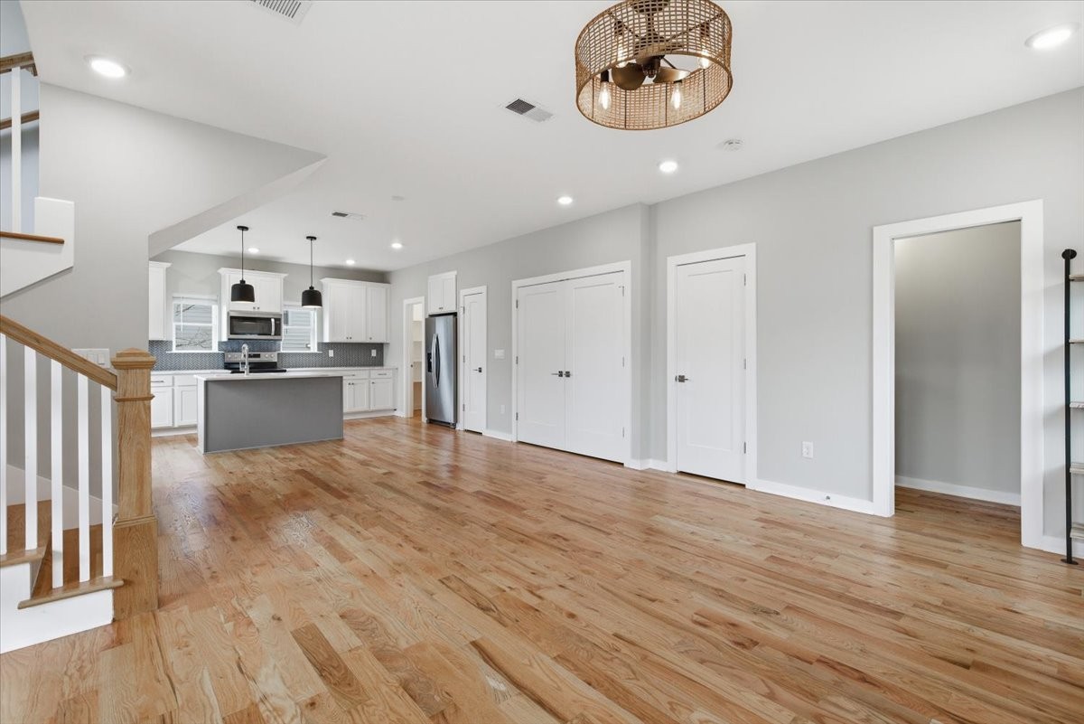 109 A Duke Street Nashville, TN 37207 - Photo 3 of 21 a view of a kitchen with a sink and a refrigerator