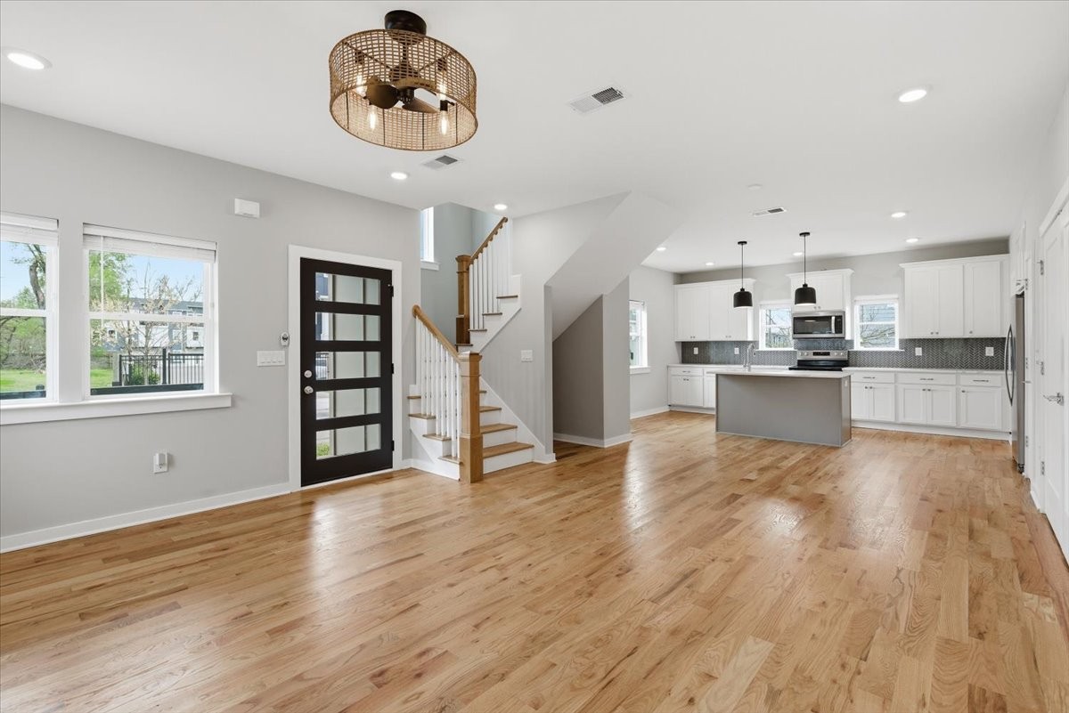 109 A Duke Street Nashville, TN 37207 - Photo 4 of 21 a view of kitchen with wooden floor and window