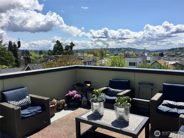 a view of a terrace with furniture