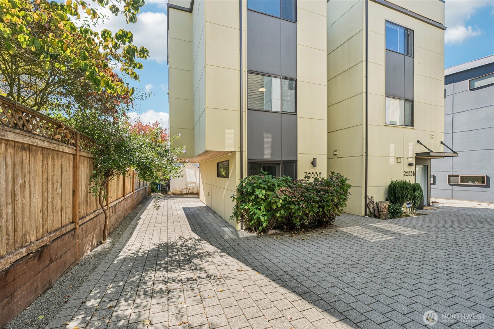 2653 Northwest 64th Street, Unit A Seattle, WA 98107 - Photo 20 of 22 a view of a pathway with a garden