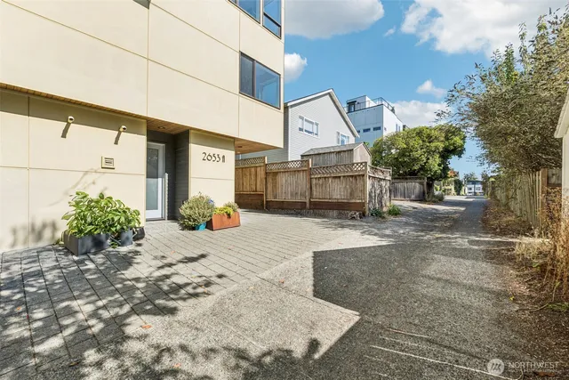 a view of a backyard of the house