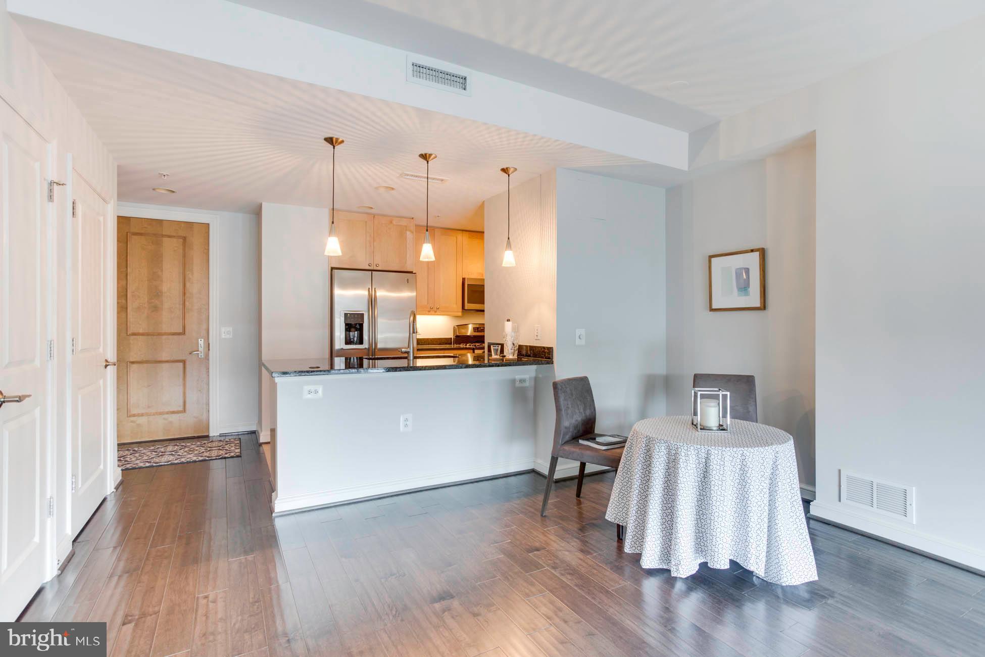 11990 Market Street, Unit 414 Reston, VA 20190 - Photo 5 of 58 Kitchen Dining Room