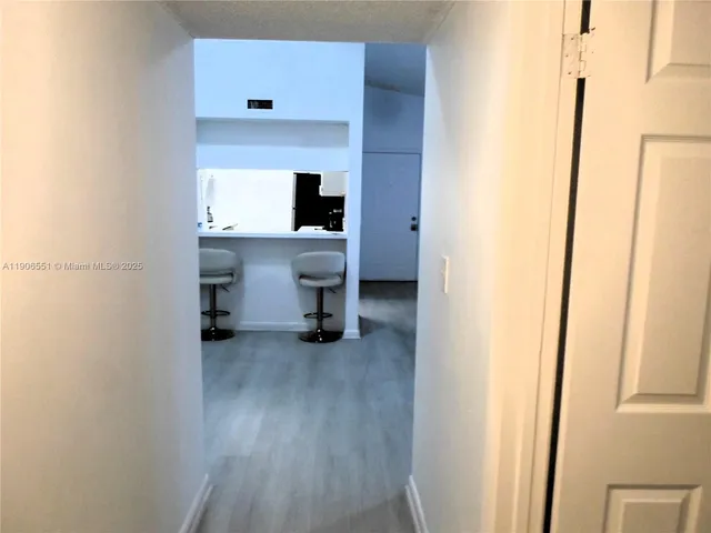 a view of kitchen and utility room