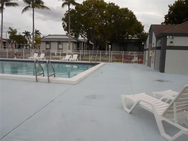 a view of street with parked cars