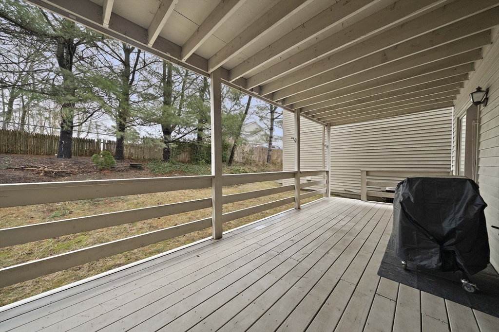 22 Union Square, Unit 22 Randolph, MA 02368 - Photo 5 of 28 a view of a porch with wooden floor