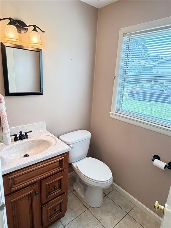 52 Lyons Drive Northwest Rome, GA 30165 - Photo 9 of 34 a bathroom with a toilet sink and mirror