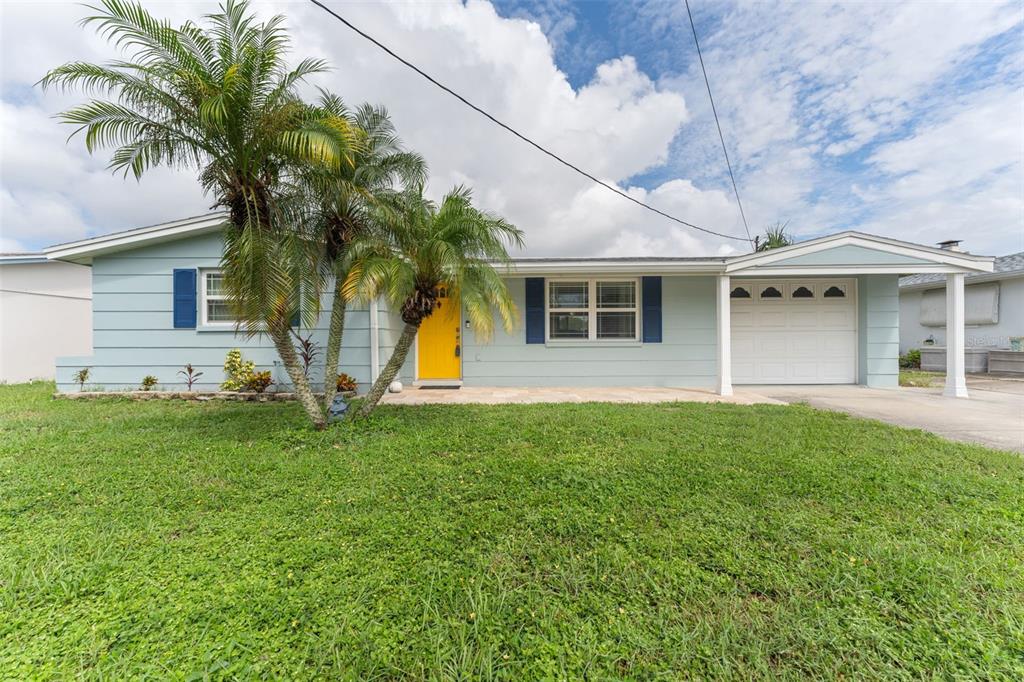 5309 Riddle Road Holiday, FL 34690 - Photo 1 of 1 a view of a house with a backyard