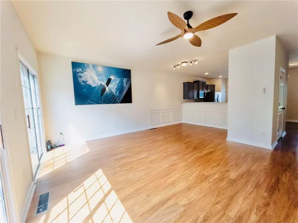 a view of a bedroom with a flat screen tv