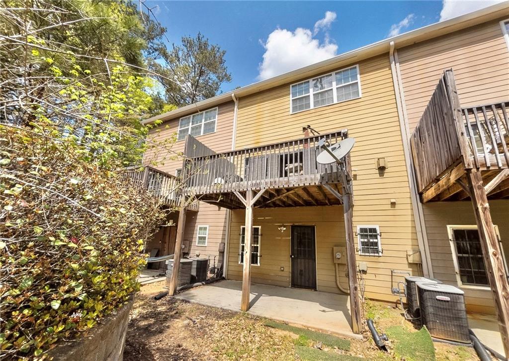 3658 Utoy Drive Southwest Atlanta, GA 30331 - Photo 3 of 28 a front view of a house with a tree