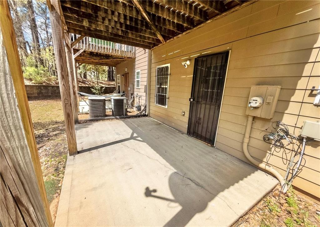 3658 Utoy Drive Southwest Atlanta, GA 30331 - Photo 4 of 28 a view of a living room with a wooden floor